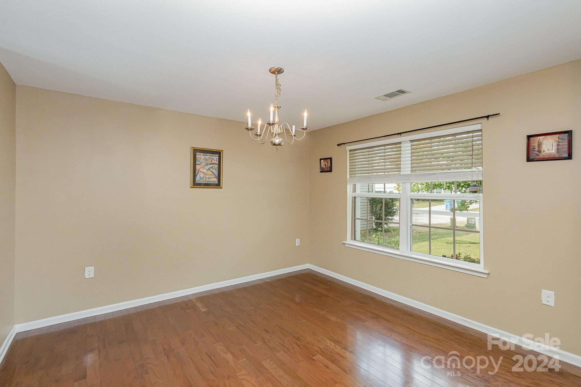 714 Waterlemon Way Monroe, NC 28110 - Photo 5 of 38 a view of an empty room with a window