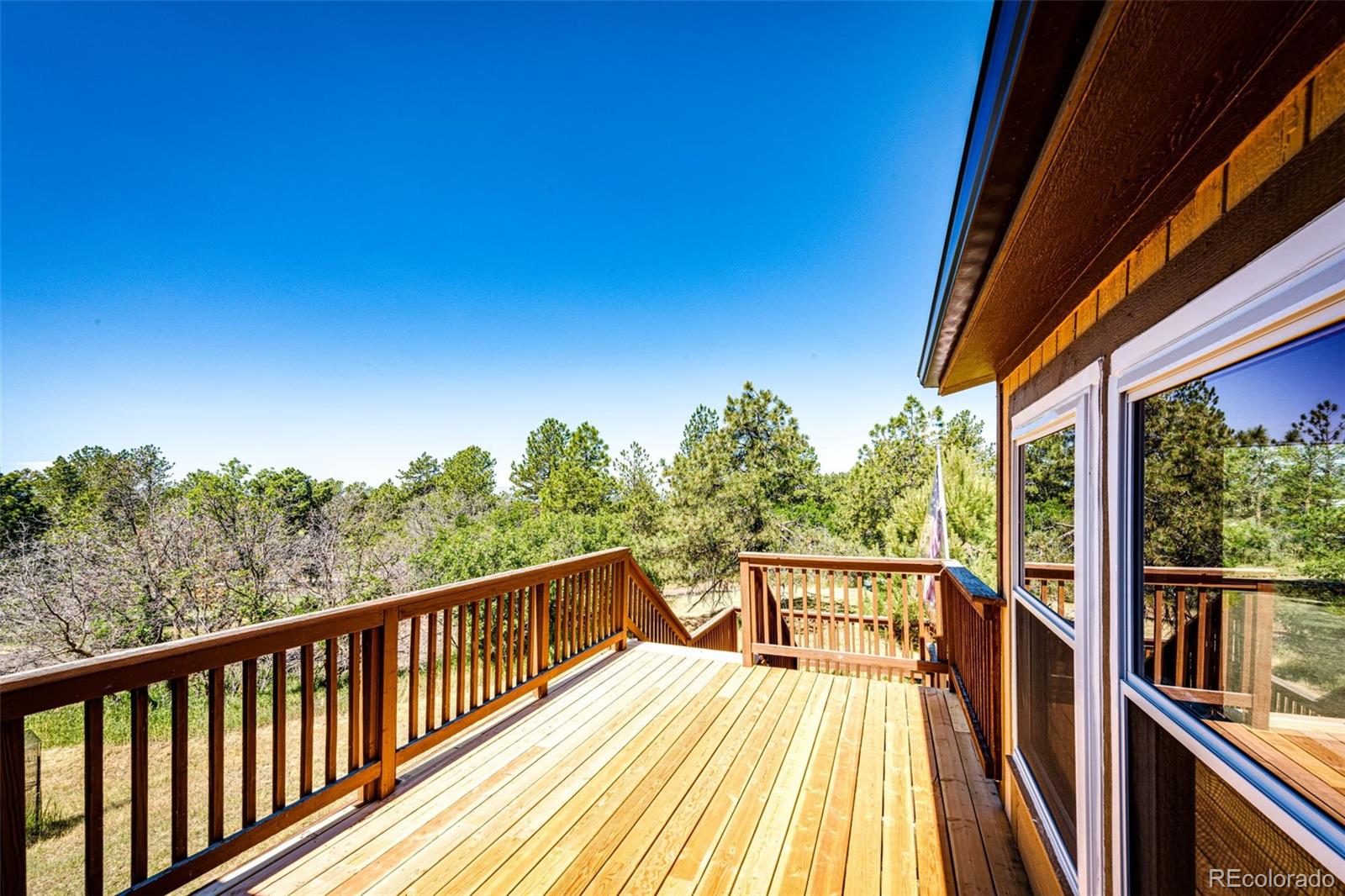 36810 View Ridge Drive Elizabeth, CO 80107 - Photo 1 of 46 a view of balcony with trees