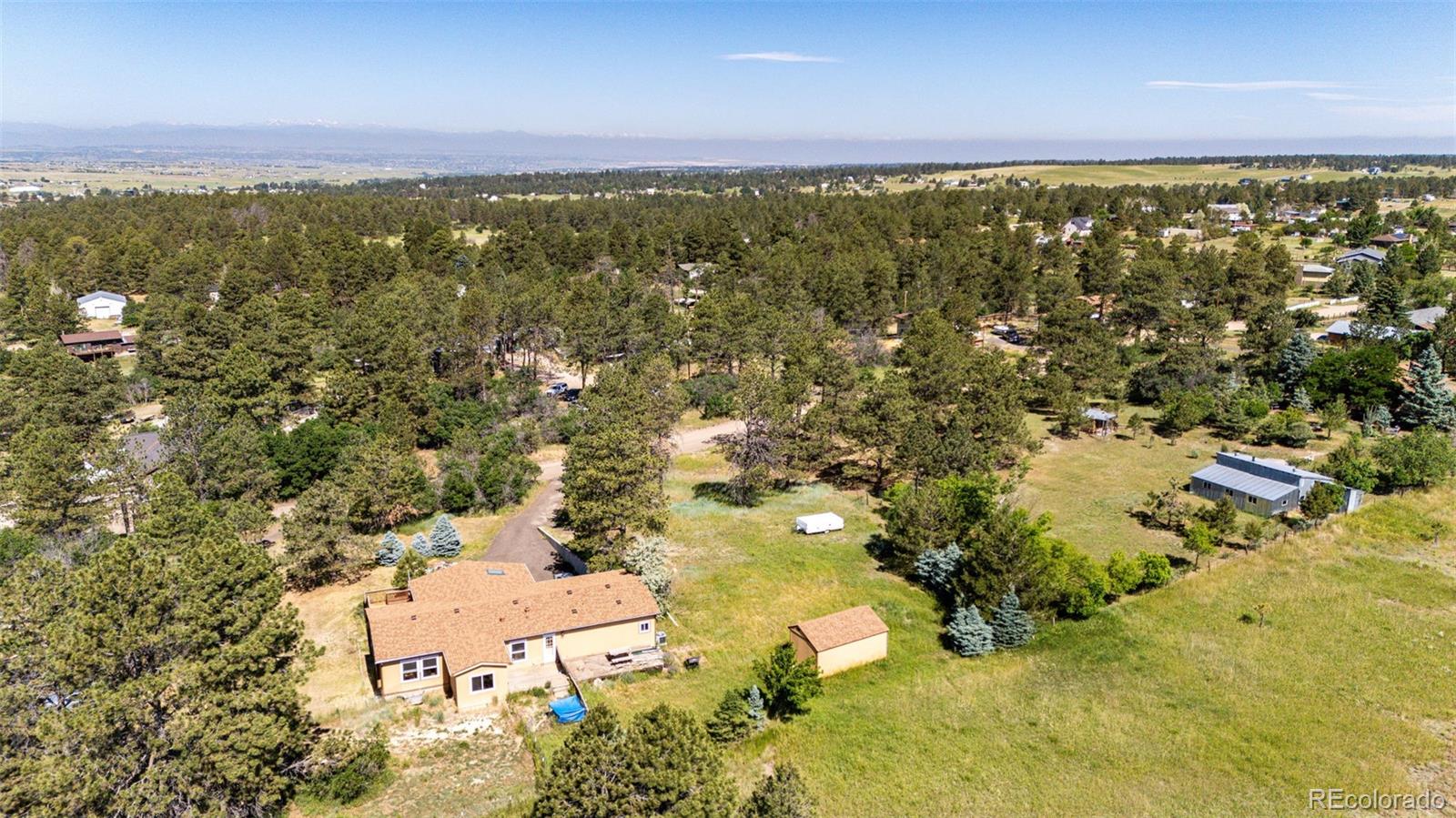 36810 View Ridge Drive Elizabeth, CO 80107 - Photo 11 of 46 an aerial view of residential houses with outdoor space and trees