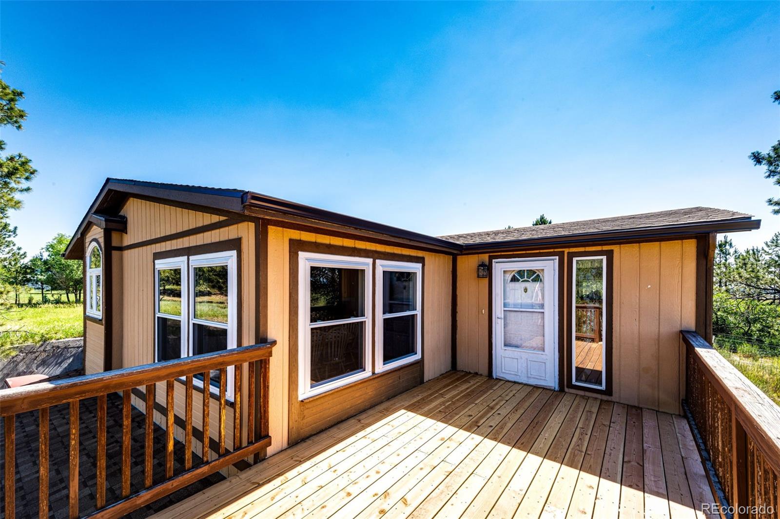 36810 View Ridge Drive Elizabeth, CO 80107 - Photo 16 of 46 a view of front door deck and a yard