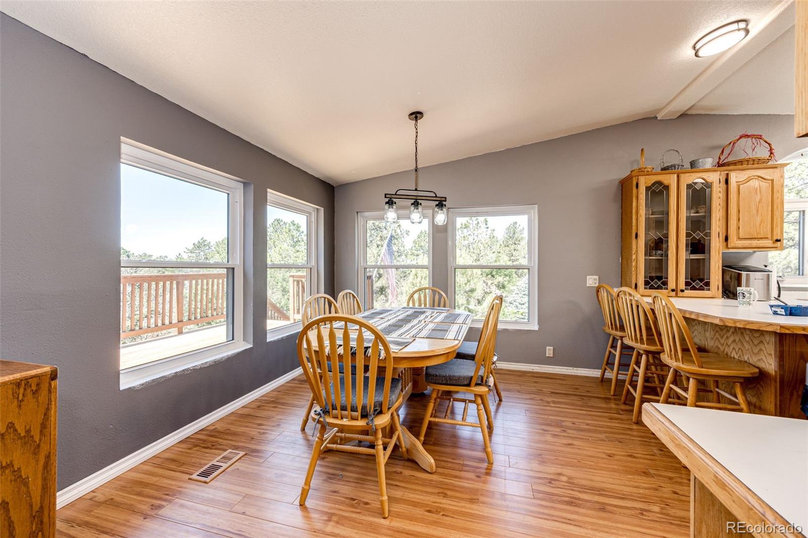 36810 View Ridge Drive Elizabeth, CO 80107 - Photo 22 of 46 a view of a dining room with furniture window and wooden floor