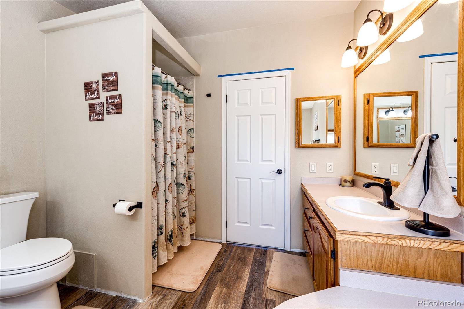 36810 View Ridge Drive Elizabeth, CO 80107 - Photo 33 of 46 a view of a bathroom with sink dryer and washer