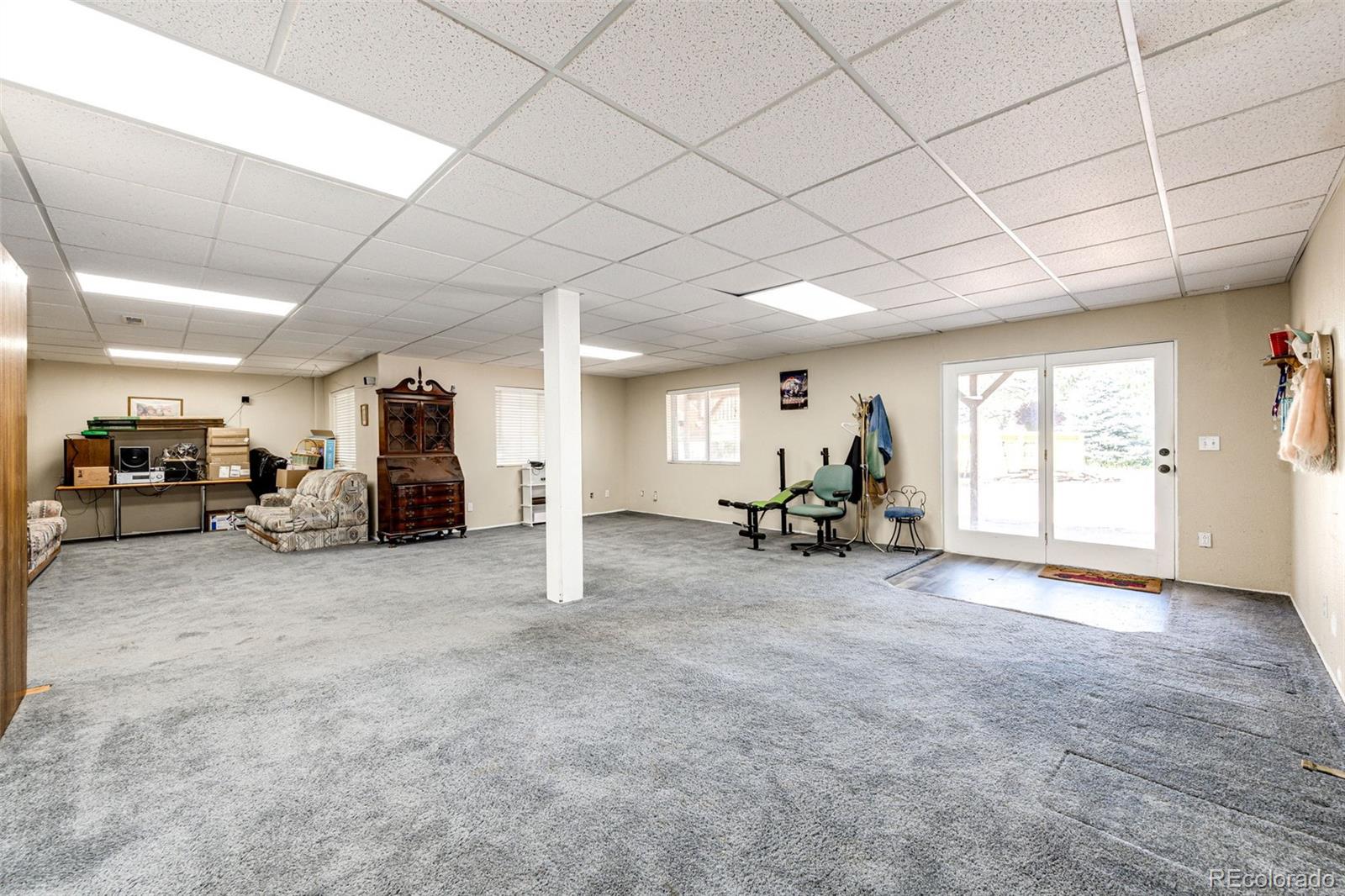 36810 View Ridge Drive Elizabeth, CO 80107 - Photo 39 of 46 a view of a livingroom with furniture and a window