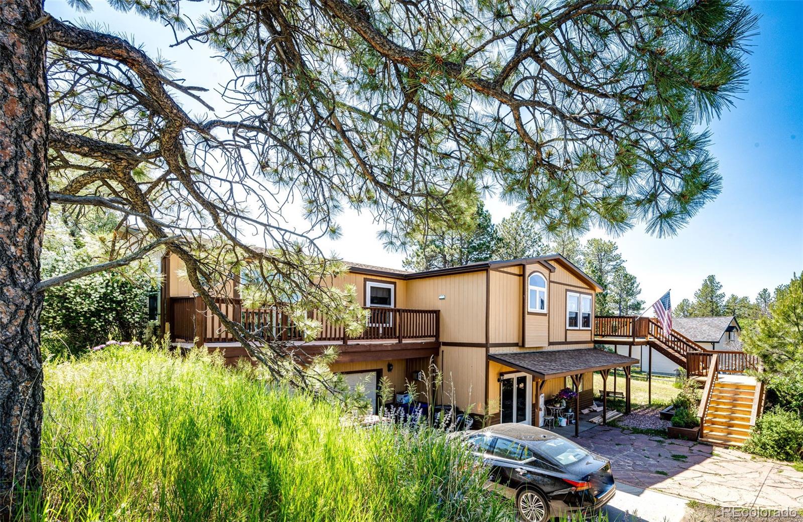 36810 View Ridge Drive Elizabeth, CO 80107 - Photo 43 of 46 a house view with a outdoor space