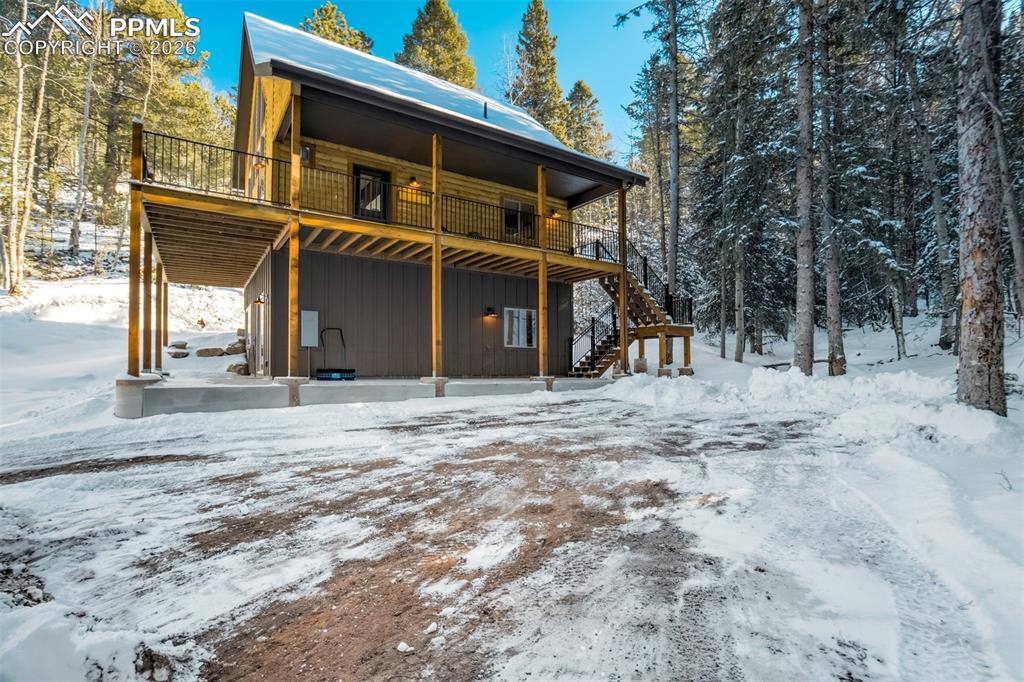 162 Kernite Lane Divide, CO 80814 - Photo 2 of 29 a view of a house with a snow on the road