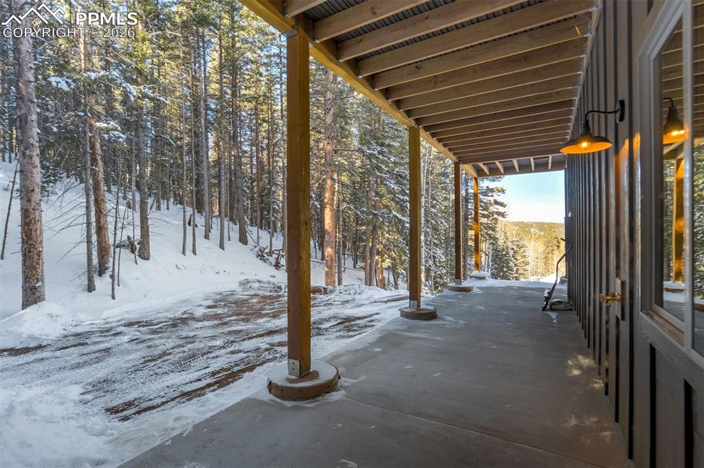 162 Kernite Lane Divide, CO 80814 - Photo 27 of 29 a view of a pathway of a house with wooden fence