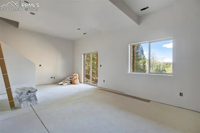 a view of a livingroom with wooden floor