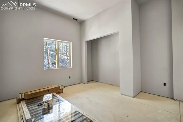 an empty room with windows