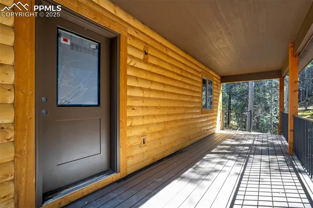a view of a brick house with an outdoor space