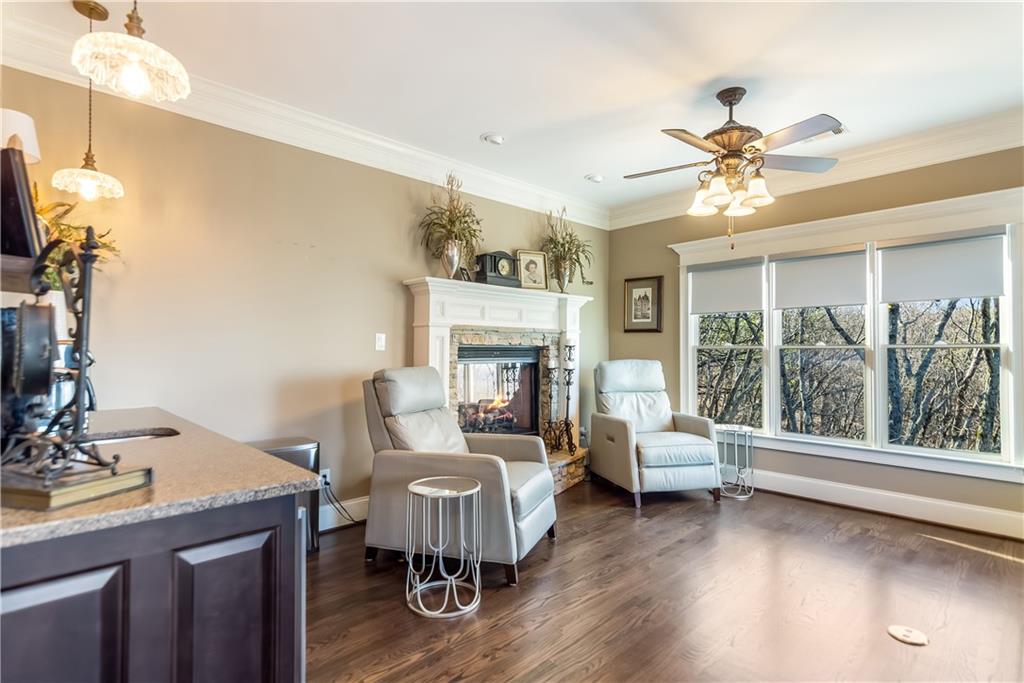 181 Valley View Vista Jasper, GA 30143 - Photo 29 of 98 a living room with furniture a fireplace and a floor to ceiling window