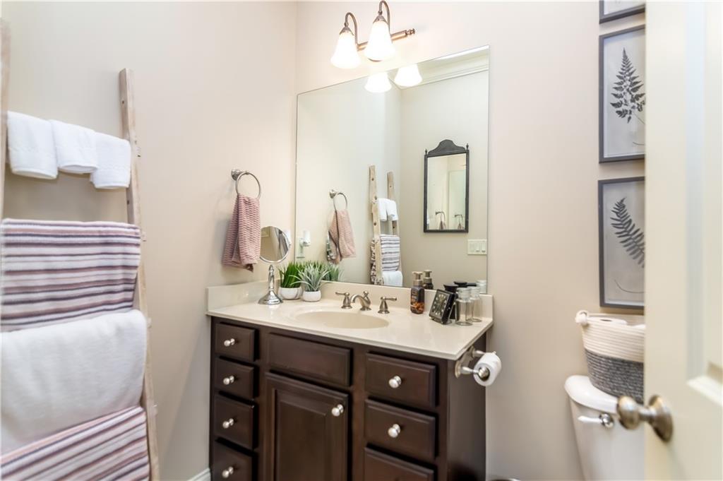 181 Valley View Vista Jasper, GA 30143 - Photo 63 of 98 a bathroom with a double vanity sink and a mirror