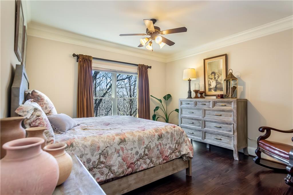181 Valley View Vista Jasper, GA 30143 - Photo 68 of 98 a bedroom with a bed and a chandelier