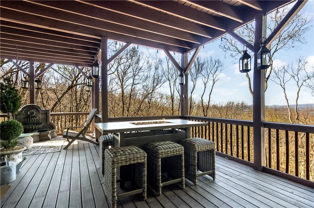 181 Valley View Vista Jasper, GA 30143 - Photo 71 of 98 a balcony with wooden floor table and chairs