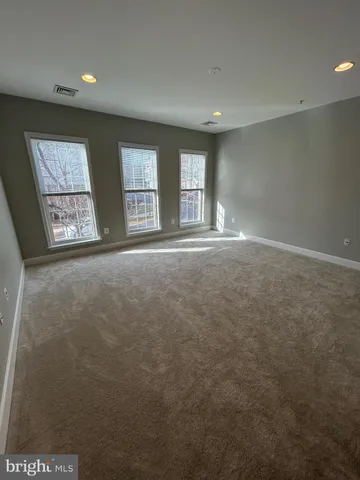 a view of a hallway and front door