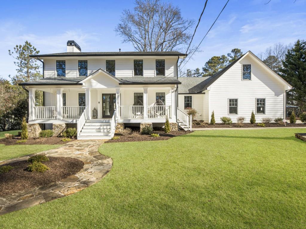 13215 Freemanville Road Milton, GA 30004 - Photo 1 of 1 a front view of a house with a yard