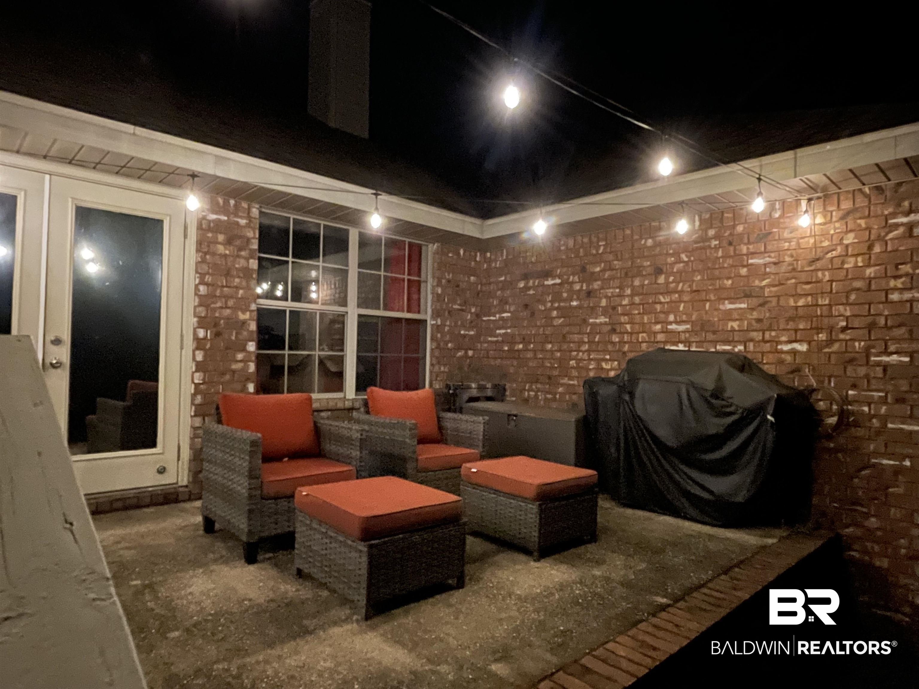 10753 Rigby Drive Mobile, AL 36695 - Photo 27 of 33 Cinema room with track lighting and brick wall