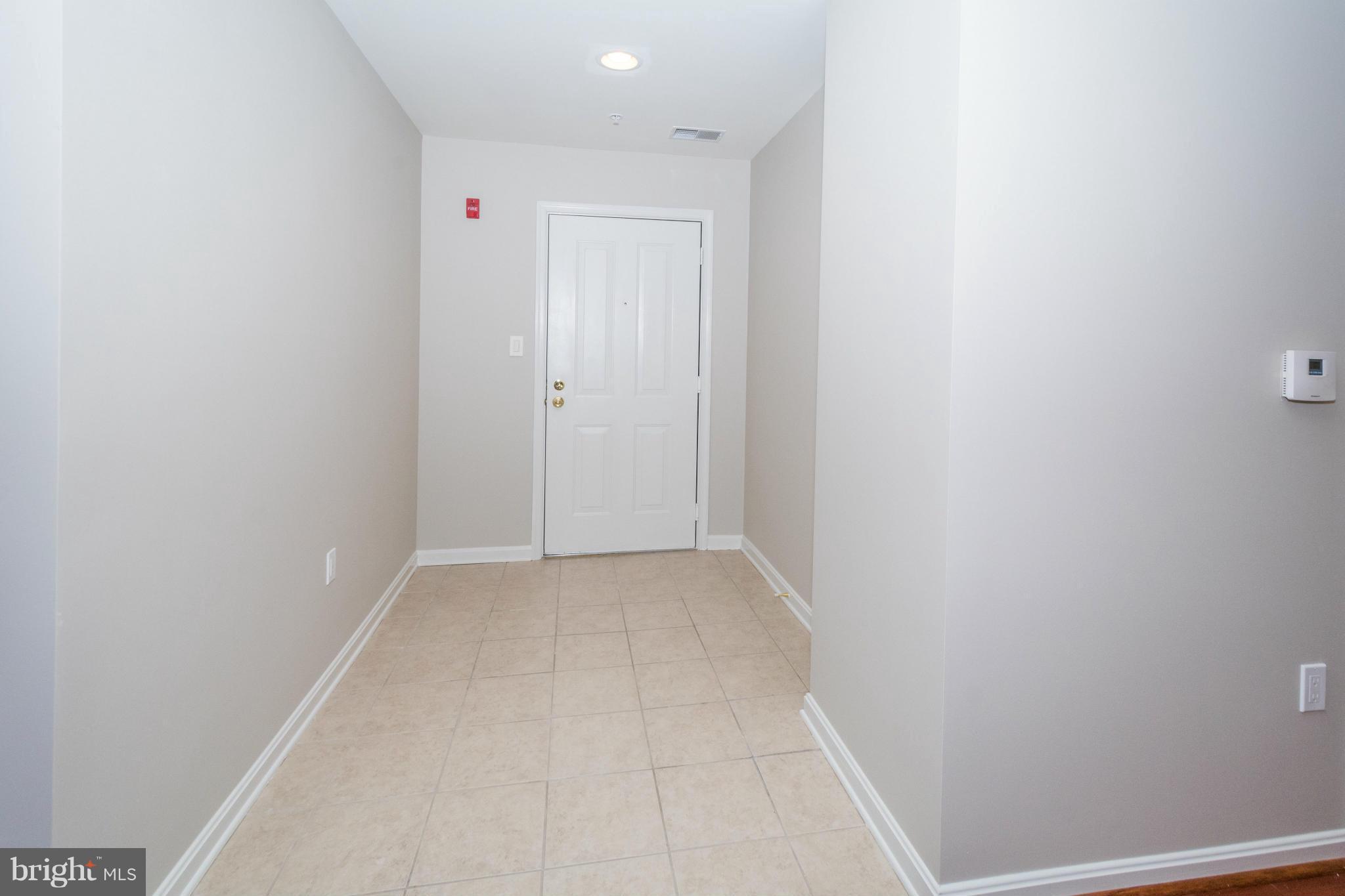 9510 Coyle Road, Unit 204 Owings Mills, MD 21117 - Photo 6 of 30 foyer