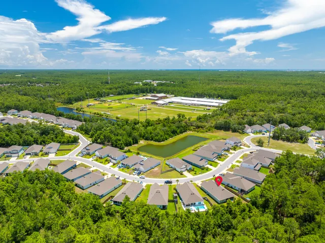 a view of yard with swimming pool
