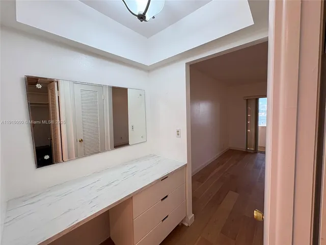 a view of a garden and swimming pool