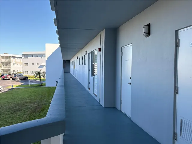 a bedroom with a bed and a table in it