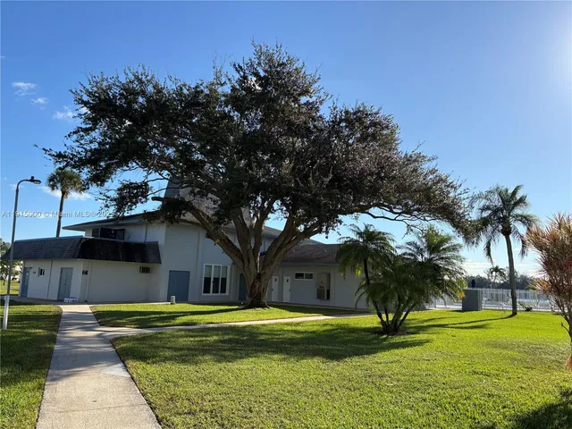 a view of a swimming pool and outdoor space