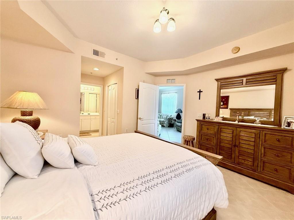 8450 Kingbird Loop, Unit 431 Estero, FL 33967 - Photo 17 of 47 Bedroom featuring ensuite bath