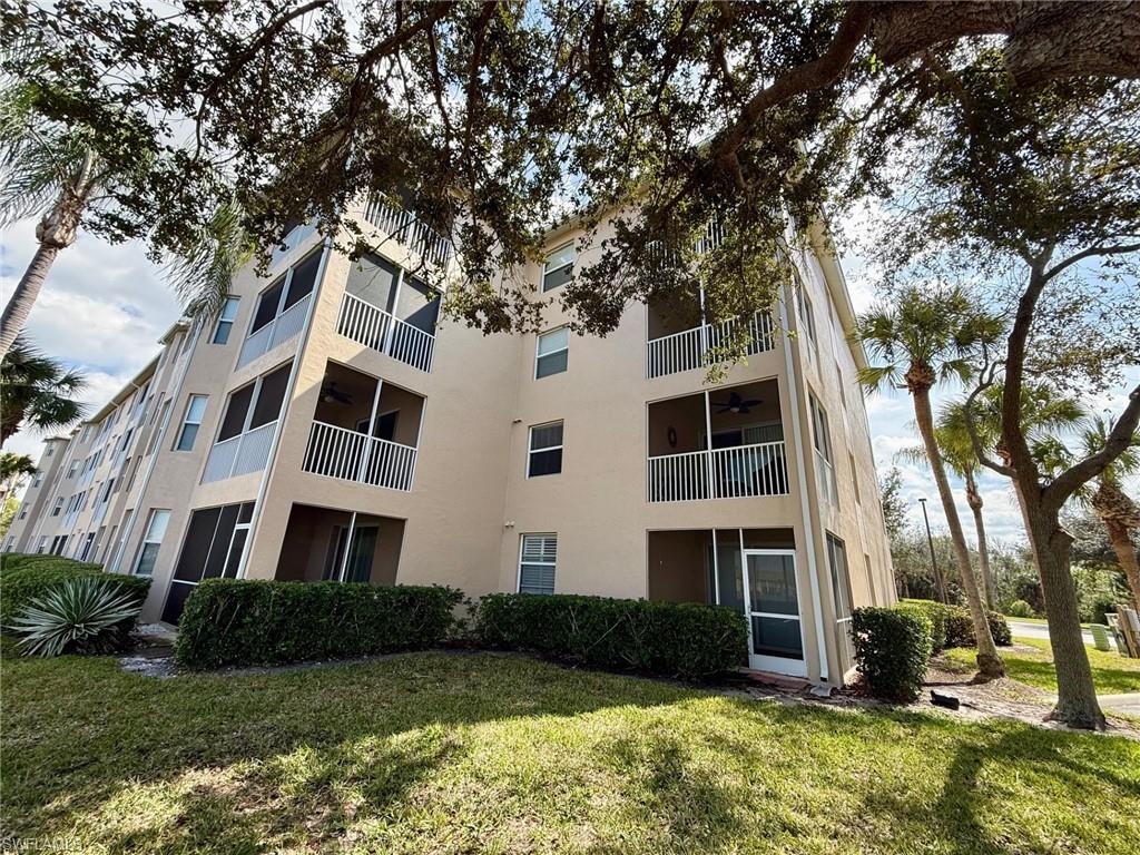 8450 Kingbird Loop, Unit 431 Estero, FL 33967 - Photo 37 of 47 View of apartment building / complex