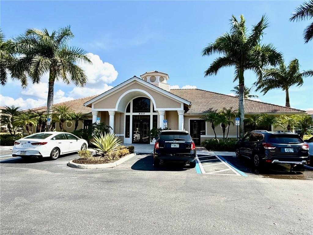 8450 Kingbird Loop, Unit 431 Estero, FL 33967 - Photo 40 of 47 View of property featuring uncovered parking