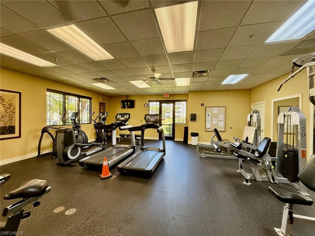 8450 Kingbird Loop, Unit 431 Estero, FL 33967 - Photo 45 of 47 Exercise room with a paneled ceiling