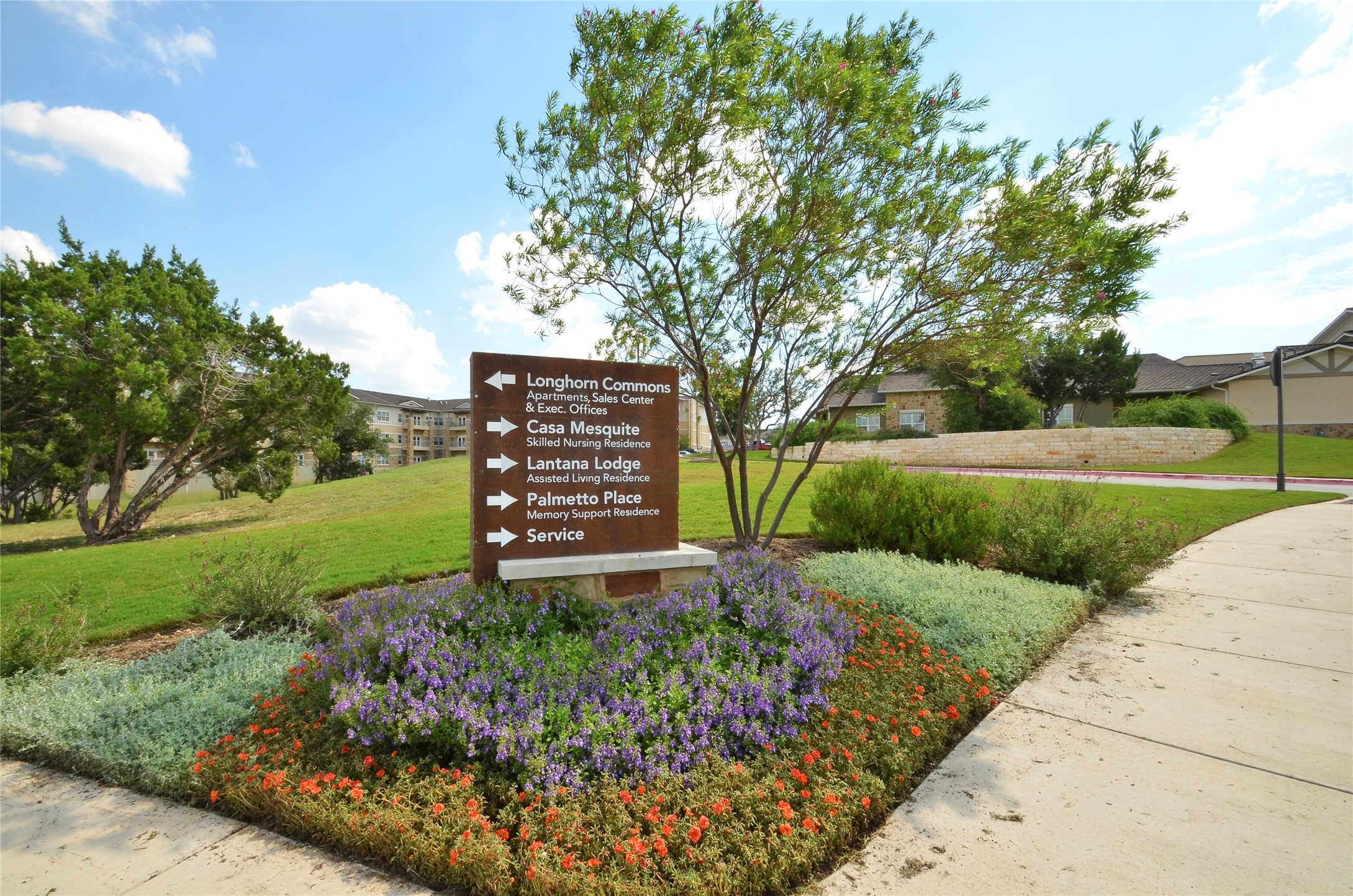3513 Grimes Ranch Road Austin, TX 78732 - Photo 24 of 32 Community sign featuring a yard