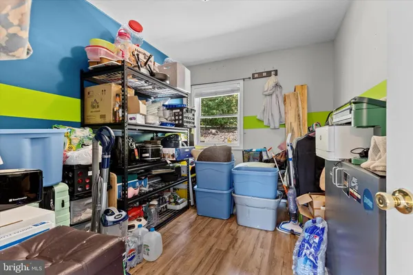 a room with furniture and a flat screen tv
