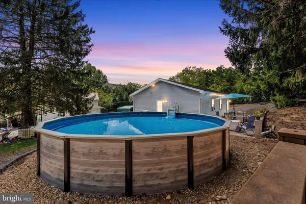 a view of outdoor space yard and swimming pool