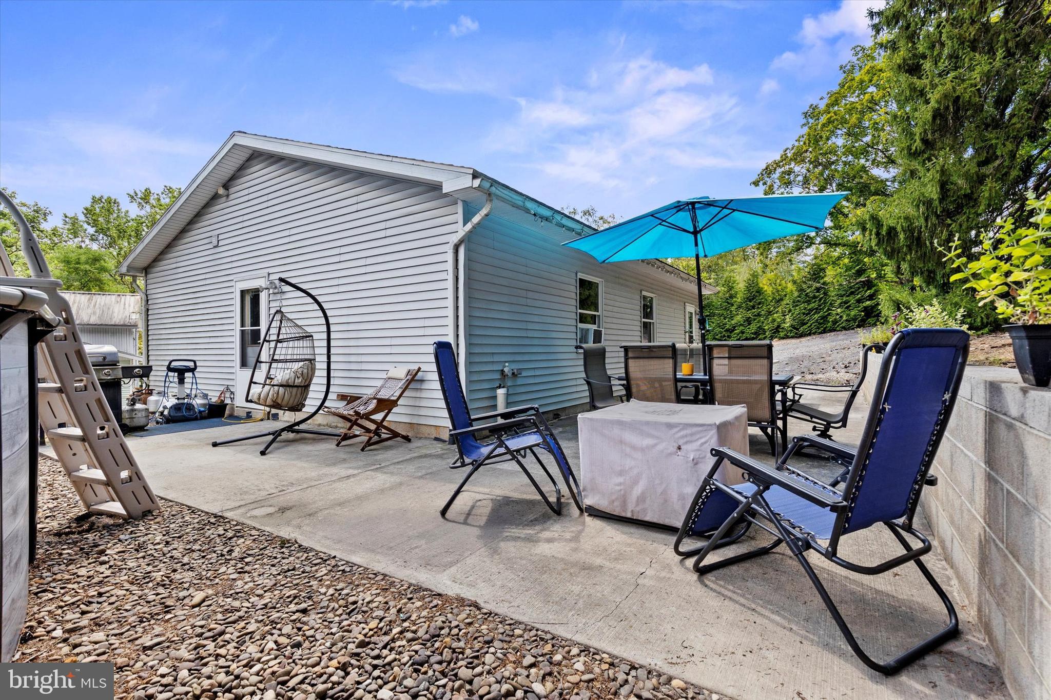 239 Hill Street Lykens, PA 17048 - Photo 20 of 43 a view of a workspace with furniture and umbrella