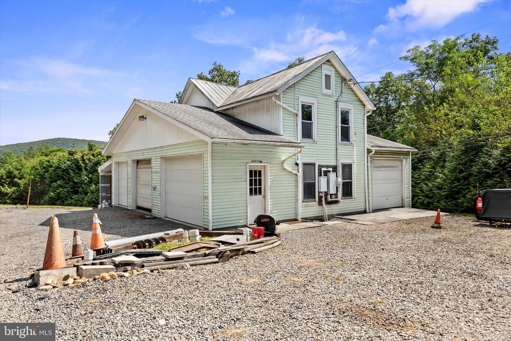 239 Hill Street Lykens, PA 17048 - Photo 22 of 43 a front view of a house with a yard