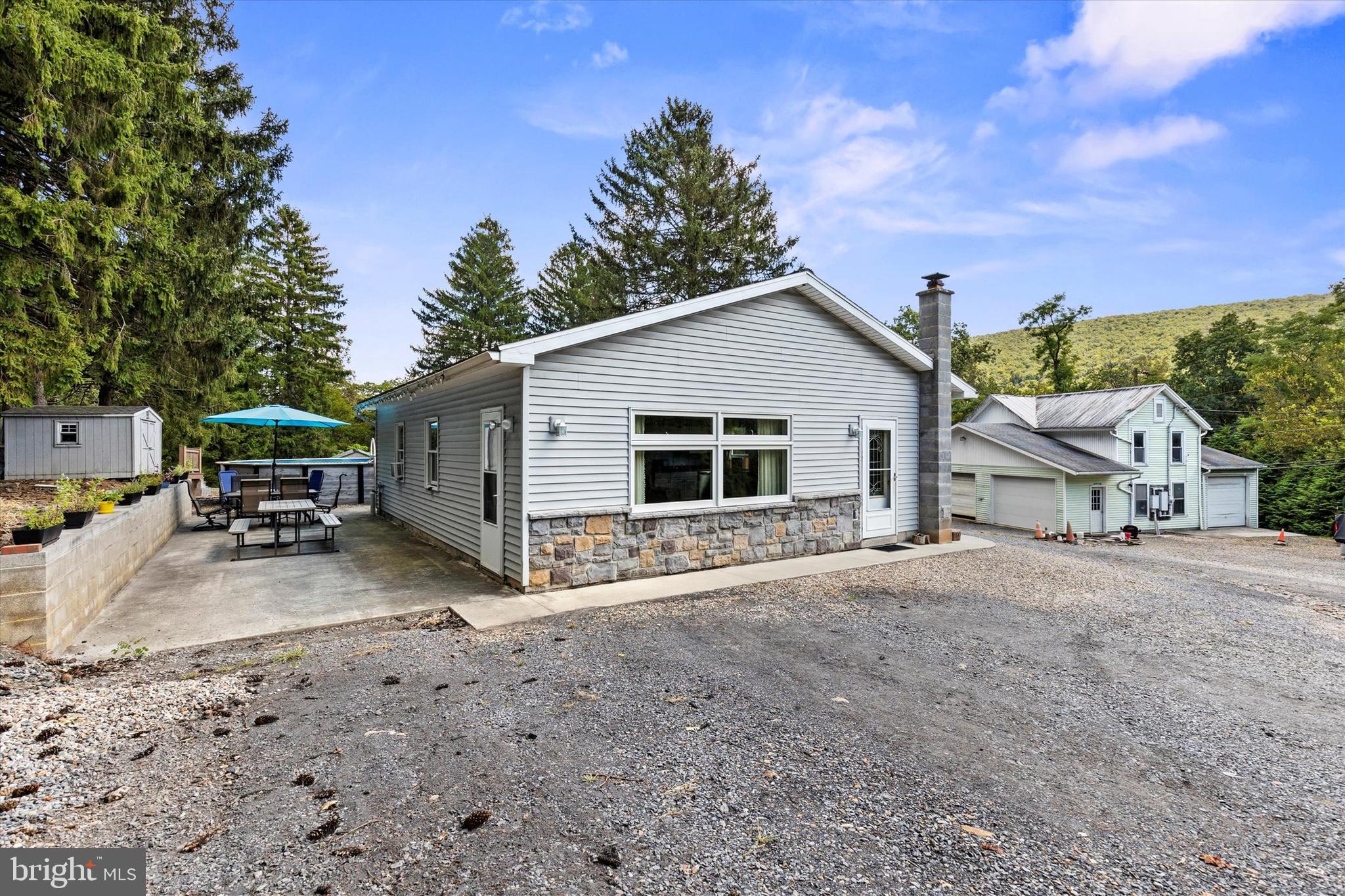 239 Hill Street Lykens, PA 17048 - Photo 3 of 43 a view of a house with backyard and sitting area