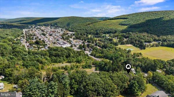 a view of a city with a yard