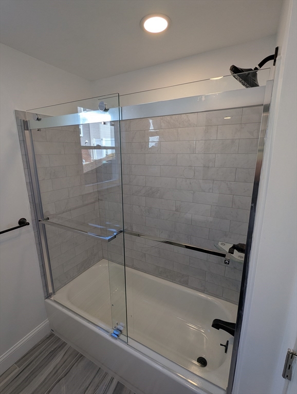 296 Fulton Street, Unit 1 Medford, MA 02155 - Photo 16 of 19 a bathroom with a shower