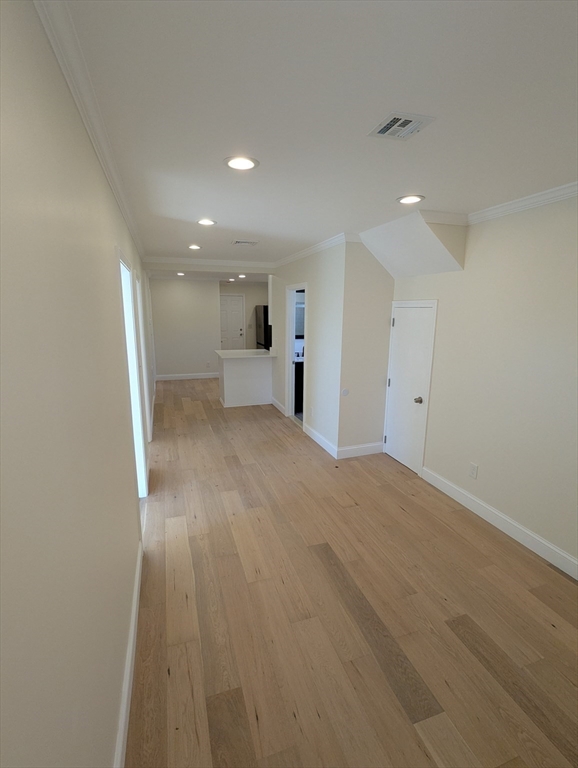 296 Fulton Street, Unit 1 Medford, MA 02155 - Photo 8 of 19 a view of a kitchen with a sink