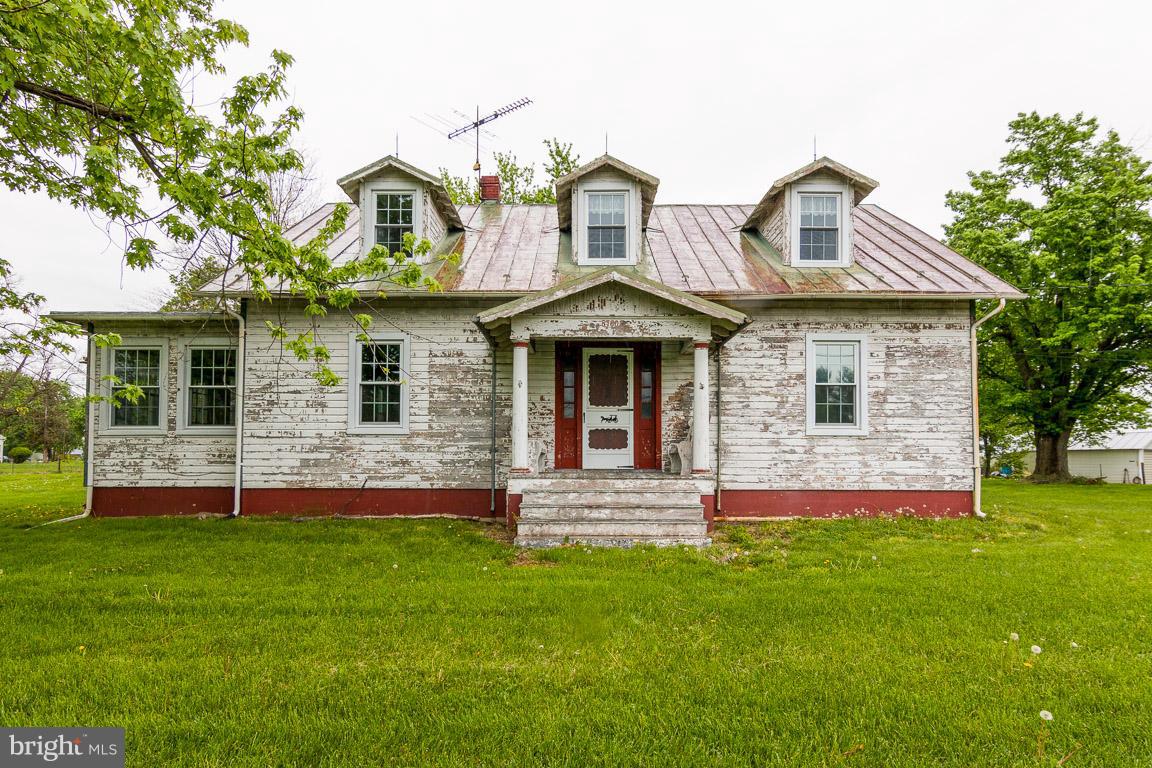 5760 Middleburg Road Keymar, MD 21757 - Photo 1 of 25 a front view of a house with a garden