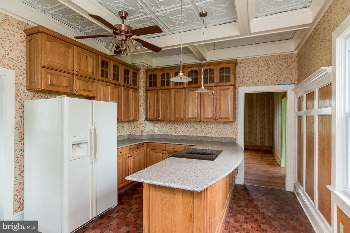 5760 Middleburg Road Keymar, MD 21757 - Photo 13 of 25 a kitchen with a refrigerator a sink and dishwasher