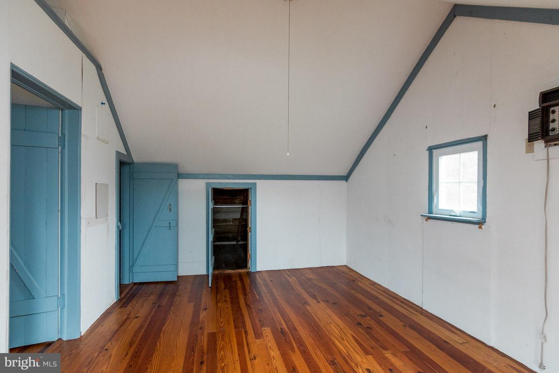 5760 Middleburg Road Keymar, MD 21757 - Photo 25 of 25 a view of empty room with wooden floor and fan