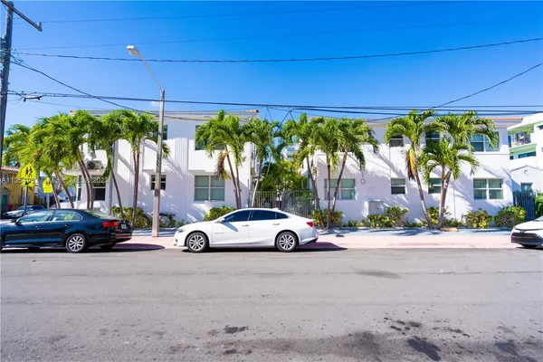 a car parked in front of a building