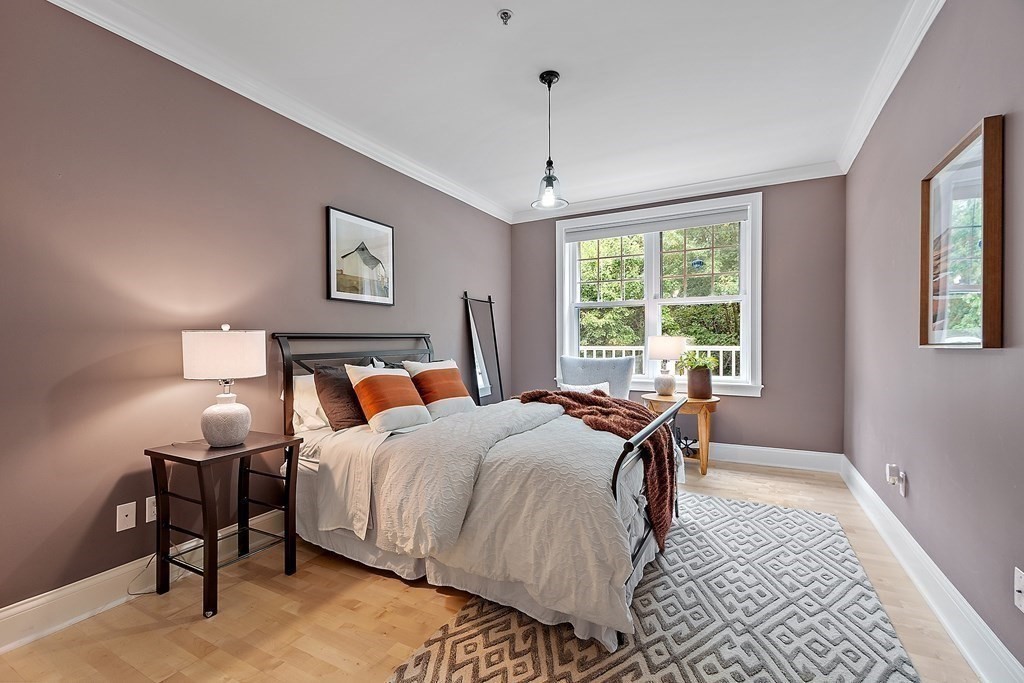 95 Conant Street, Unit 304 Concord, MA 01742 - Photo 15 of 23 a bed room with a bed and a window