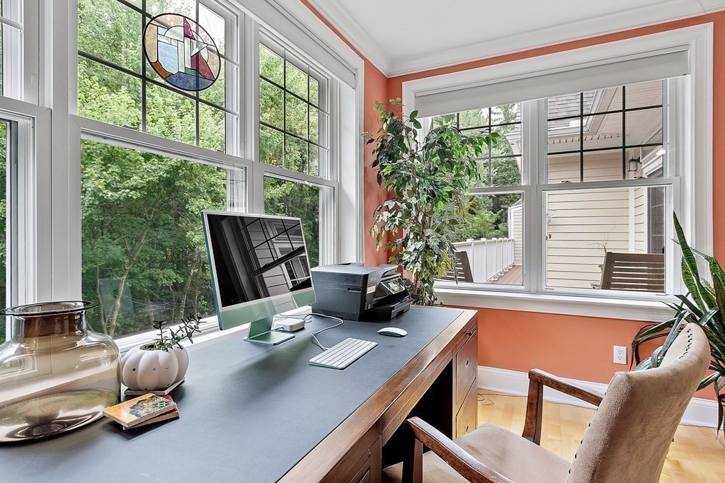 95 Conant Street, Unit 304 Concord, MA 01742 - Photo 17 of 23 a view of a dining room with furniture window and outside view