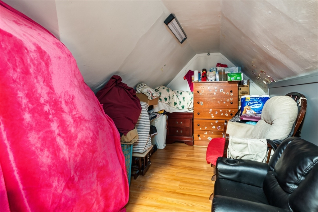 17 Ashton Street Everett, MA 02149 - Photo 28 of 42 a living room with furniture and a couch
