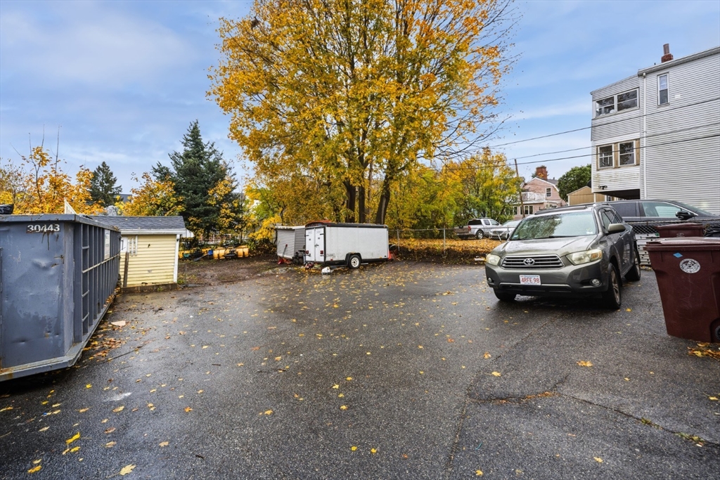 17 Ashton Street Everett, MA 02149 - Photo 41 of 42 a view of a street with cars parked
