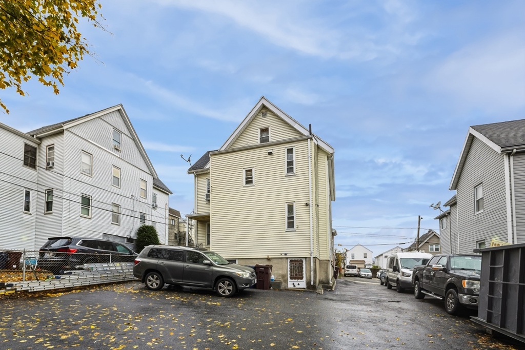 17 Ashton Street Everett, MA 02149 - Photo 42 of 42 a car parked in front of a building