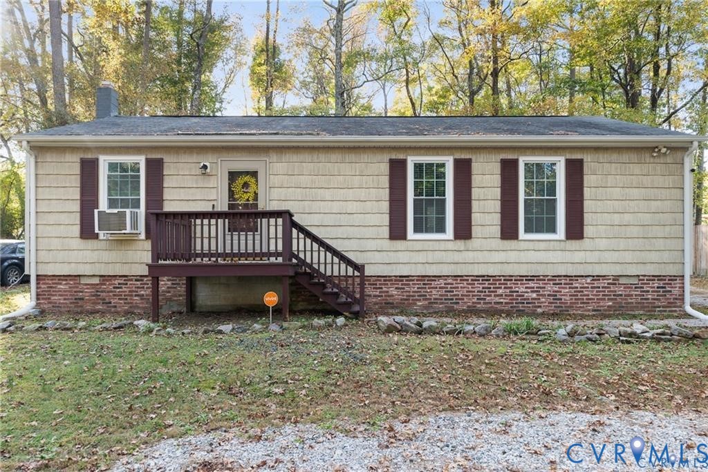 21104 Matoaca Road Petersburg, VA 23803 - Photo 1 of 22 a front view of a house with a garden
