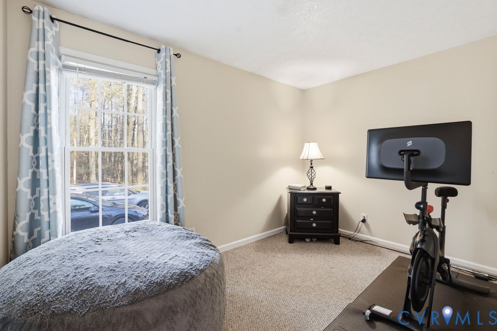 21104 Matoaca Road Petersburg, VA 23803 - Photo 17 of 22 a bedroom with furniture and a window