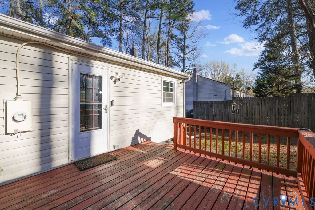 21104 Matoaca Road Petersburg, VA 23803 - Photo 19 of 22 a view of a wooden deck with a yard